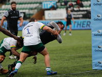    George McGuigan of Newcastle Falcons evades the clutches of Will Goodrick-Clarke of London Irish to score during the Gallagher Premiershi...