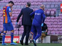 Sergio Busquets is injured during the match between FC Barcelona and Club Atletico Madrid, corresponding to the week 35 of the Liga Santande...
