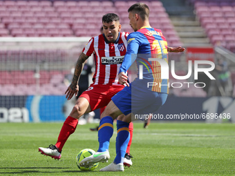 Angel Correa and Clement Lenglet during the match between FC Barcelona and Club Atletico Madrid, corresponding to the week 35 of the Liga Sa...