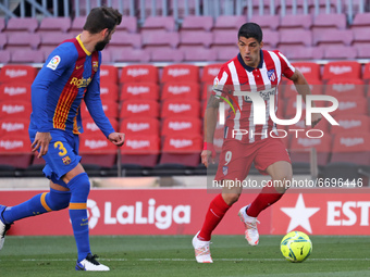 Luis Suarez and Gerard Pique during the match between FC Barcelona and Club Atletico Madrid, corresponding to the week 35 of the Liga Santan...