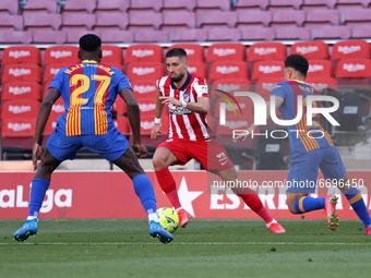 Ilaix Moriba, Sergino Dest and Yannick Carrasco during the match between FC Barcelona and Club Atletico Madrid, corresponding to the week 35...