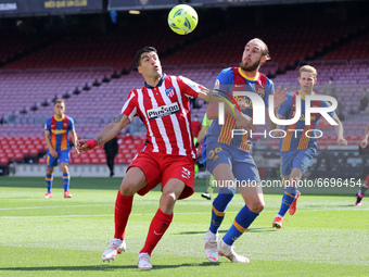 Luis Suarez and Oscar Mingueza during the match between FC Barcelona and Club Atletico Madrid, corresponding to the week 35 of the Liga Sant...