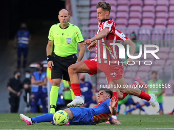 Marcos Llorente and Pedri during the match between FC Barcelona and Club Atletico Madrid, corresponding to the week 35 of the Liga Santander...