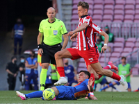 Marcos Llorente and Pedri during the match between FC Barcelona and Club Atletico Madrid, corresponding to the week 35 of the Liga Santander...