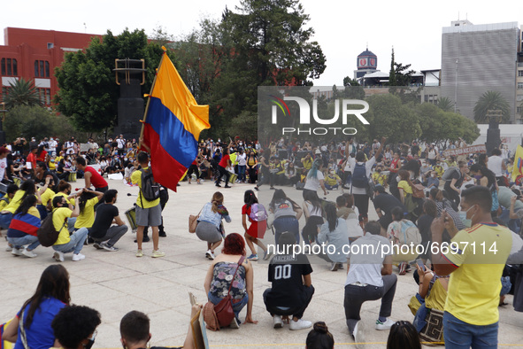 Protesters take part during a demonstration at Monument of Revolution to protest against the repression and killings in Colombia of proteste...