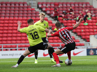  Jack Diamond of Sunderland in action with Bryn Morris  during the Sky Bet League 1 match between Sunderland and Northampton Town at the Sta...