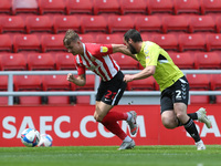   Jack Diamond of Sunderland in action with Michael Harriman of Northampton Town during the Sky Bet League 1 match between Sunderland and No...