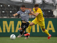 Andrija Živković #14 of PAOK and Nicholas Ioannou #44 of Aris in action during the soccer match between PAOK v Aris for the Play-off of Supe...