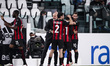 Milan midfielder Brahim Diaz (21) celebrates with Milan coach Stefano Pioli and his teamma...