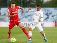 Lucas Ocampos of Sevilla CF in action with Casemiro of Real Madrid during the Spanish Liga Santander match between Real Madrid and Sevilla F...