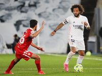 Marcelo of Real Madrid in action with Jesus Navas of Sevilla CF during the Spanish Liga Santander match between Real Madrid and Sevilla FC a...