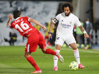 Marcelo of Real Madrid in action with Jesus Navas of Sevilla CF during the Spanish Liga Santander match between Real Madrid and Sevilla FC a...