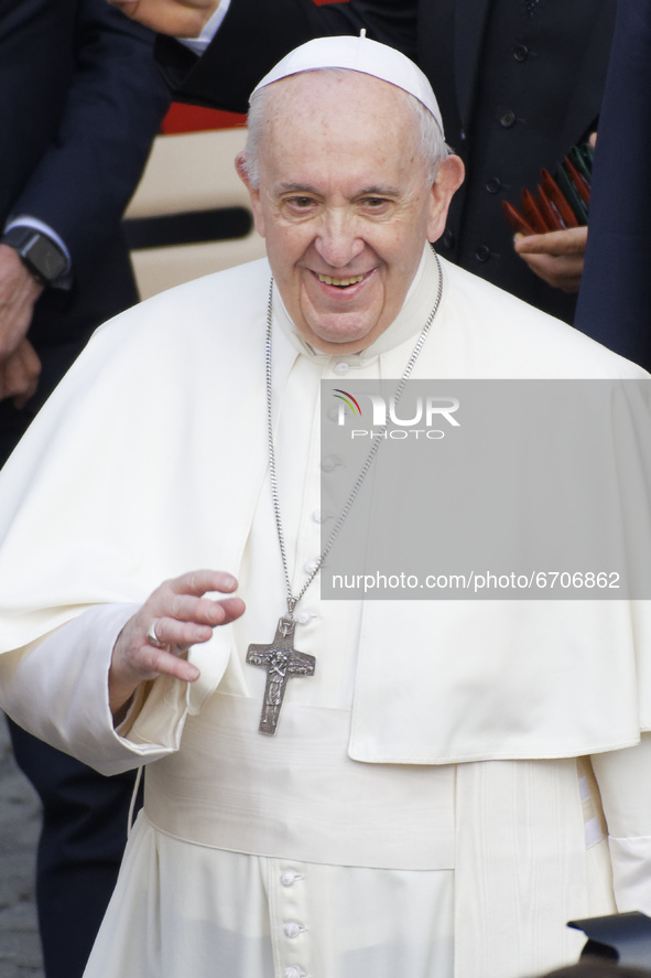Pope Francis attends in the St. Damaso Courtyard at the Vatican for his weekly general audience, Wednesday, May 12, 2021.  
