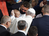 Pope Francis attends in the St. Damaso Courtyard at the Vatican for his weekly general audience, Wednesday, May 12, 2021.  (