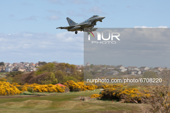 A Royal Air Force Eurofighter Typhoon crosses Moray Golf Course during Exercise Joint Warrior at RAF Lossiemouth, Scotland on 11th May 2021....