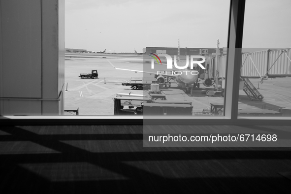 A plane sits ready for passengers to board for flight at Dallas-Fort Worth International Airport on April 12, 2021. As America’s COVID-19 va...
