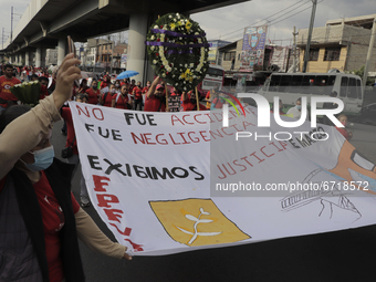 Members of the Francisco Villa Independent Popular Front march on Avenida Tláhuac to demand justice for the 26 people who died after a colum...