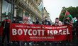 The banner reads 'Against colonialism, racism and apartheid: boycott Israel'. Hundreds of...