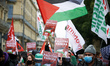 Palcards read 'Palestine will win'. Hundreds of people gathered in support of Gaza and the...