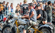 Two persons mounted on his Harley Davidson in the Barcelona Harley Days held in Barcelona...