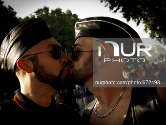 SPAIN, Madrid:Two boys kissing during the 2015 gay pride parade in Madrid on July 4, 2015. ( 