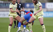 Katie McCabe and Noelle Maritz of Arsenal tackle a Crystal Palace player during the Vitali...