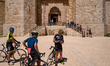 Cyclists and people queuing to visit Castel del Monte on the day of reopening on May 22, 2...