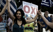 People celebrating the results of the refendum with traditional dances at Sydagma Square i...
