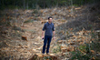Thomas Brail stands amid the clearcutting. Thomas Brail is an arborist known for his fight...