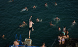 A swimmer jumps into the sea at the Vico bathing place, Hawk Cliff, in Dalkey.On Tuesday,...