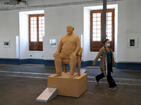 Chinese artist Ai Weiwei Brainless Figure in Cork" self-portrait sculpture made of cork is seen during a press preview of his new exhibition...
