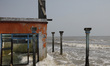 An abandoned house demaged by tidal waves in Simonet village, northern coast of Pekalongan...