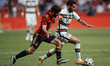 Rafa Silva (SL Benfica) of Portugal and Jose Gaya (Valencia CF) of Spain compete for the b...