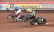 Jake Allen  (Yellow) chases Charles Wright  (Blue) during the SGB Premiership match betwe...