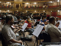 Musicians of the National Symphony Orchestra of Venezuela, performs the  Symphonic Gala sound check on stage as part of the celebration of t...