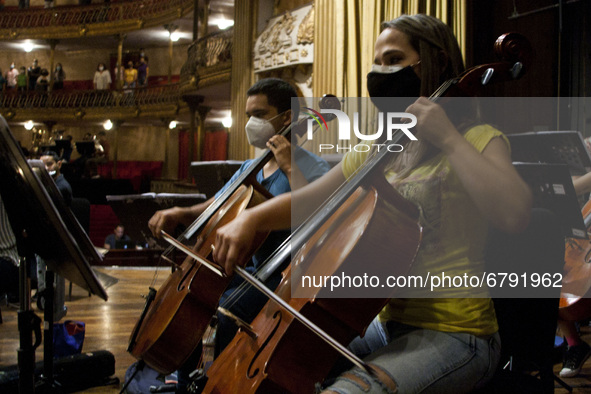 Musicians of the National Symphony Orchestra of Venezuela, performs the  Symphonic Gala sound check on stage as part of the celebration of t...