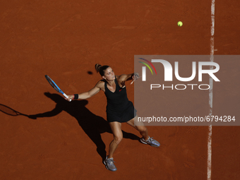 Greece's Maria Sakkari returns the ball to Czech Republic's Barbora Krejcikova during their women's singles semi-final tennis match on Day 1...