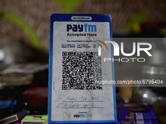 Paytm digital barcode scanner can be seen in Kolkata, India, 11 June, 2021.  can be seen in Kolkata, India, 11 June, 2021. Paytm, Infosys an...