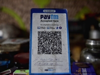 Paytm digital barcode scanner can be seen in Kolkata, India, 11 June, 2021.  can be seen in Kolkata, India, 11 June, 2021. Paytm, Infosys an...