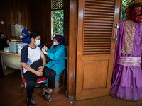 Coronavirus vaccination with AstraZeneca covid-19 vaccine, in Jakarta, Indonesia, on June 14, 2021.  (