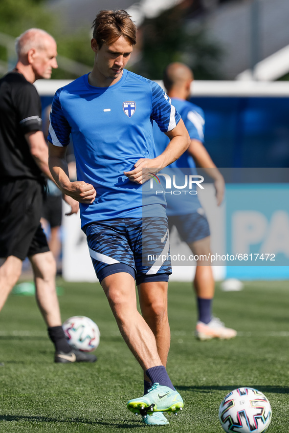 Lassi Lappalainen of Finland passes the ball during a Finland national team training session ahead of their UEFA Euro 2020 match against Bel...