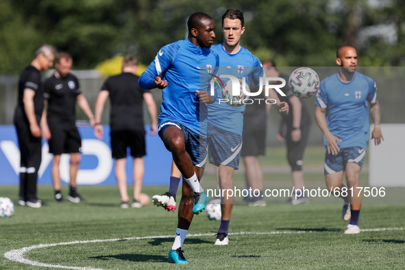 (L to R) Glen Kamara, Thomas Lam and Nikolai Alho of Finland in action during a Finland national team training session ahead of their UEFA E...