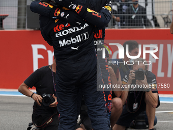 Max Verstappen of Netherlands and Sergio "Checho" Perez of Mexico and Red Bull Racing greets each other after the F1 Grand Prix of France at...
