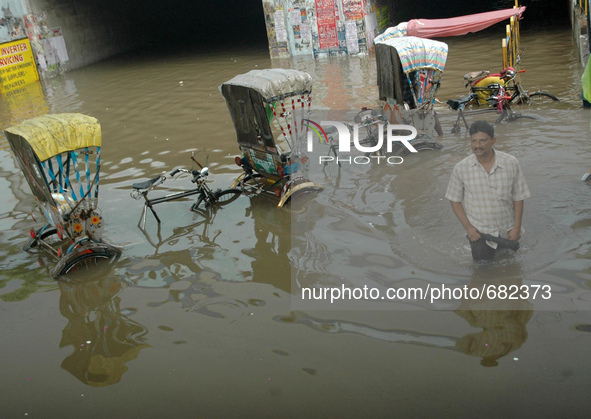 Waterlogged city of joy Kolkata Road following heavy rain on July 10,2015 in Kolkata, India 