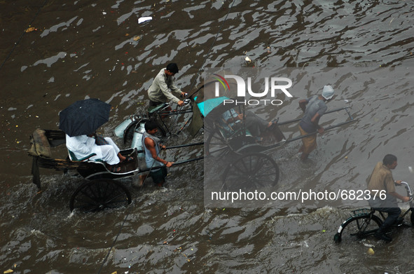 Waterlogged city of joy Kolkata Road following heavy rain on July 10,2015 in Kolkata, India 