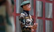 Indian Army Soldier holds a Knife takes part in an Event in Baramulla, Jammu and Kashmir,...