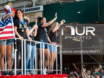 July 10, 2015 - New York, New York - Members of the women world cup championship team ride a float up Broadway.  The 2015 Women's World Cup...