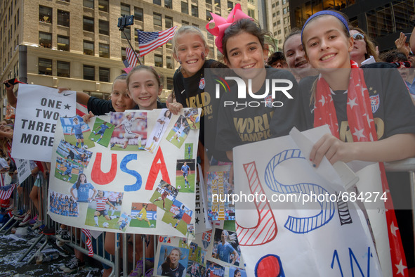 July 10, 2015 - New York, New York - Girls celebrate the American victory at the 2015 Womens World Cup.  The 2015 Women's World Cup Champion...