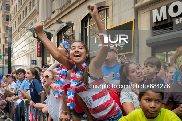 July 10, 2015 - New York, New York - Fans celebrate the American victory at the 2015 Womens World Cup.  The 2015 Women's World Cup Champions...