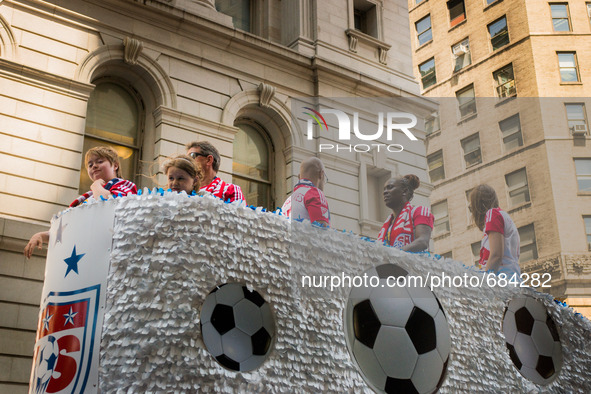 July 10, 2015 - New York, New York - Members of the 2015 Womens World Cup Championship team ride a float on Broadway.  The 2015 Women's Worl...